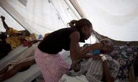 Haityje cholera nusinešė jau 1344 žmonių gyvybes